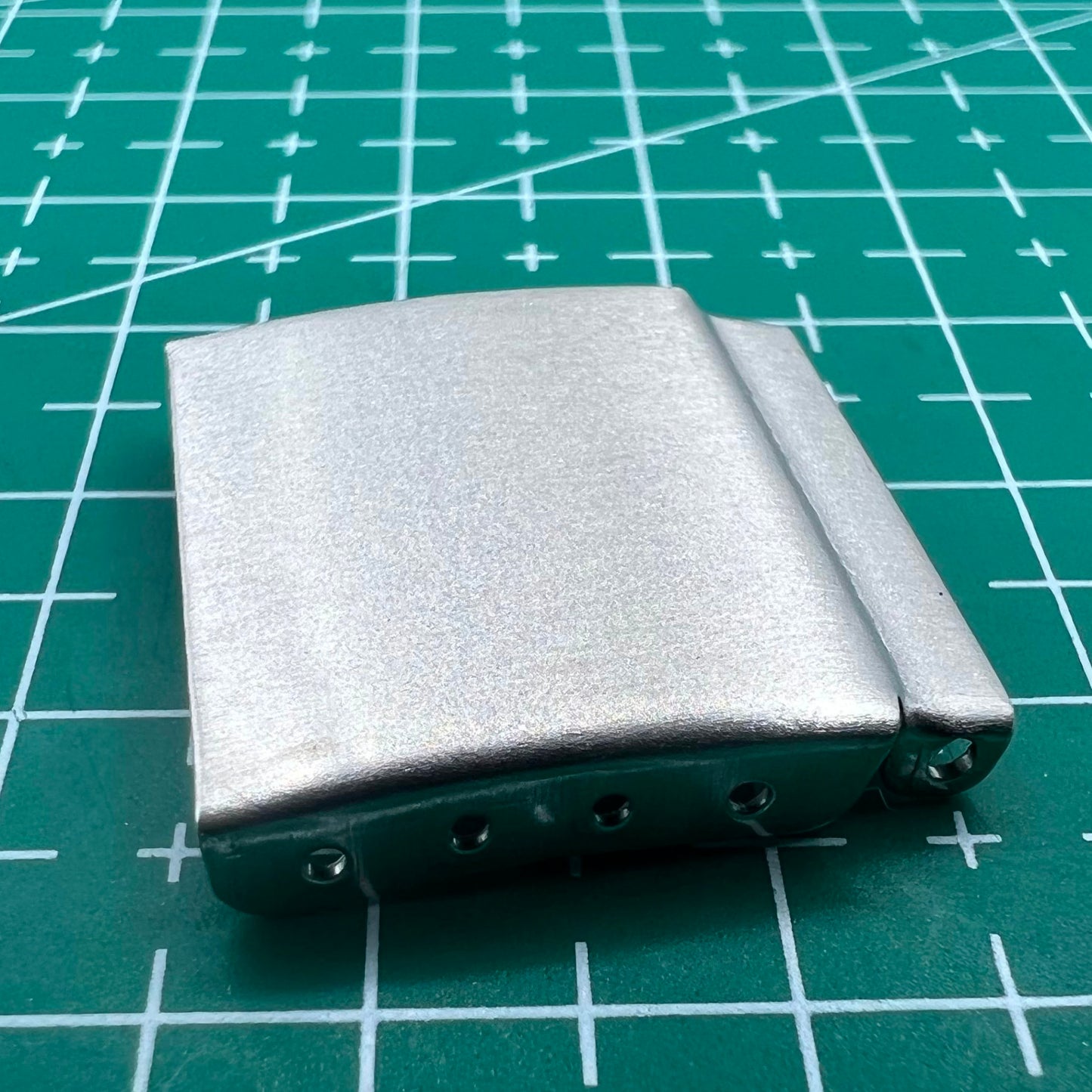 Silver watch strap extenders with clasps, set of 14 for customizable bracelet length adjustment.