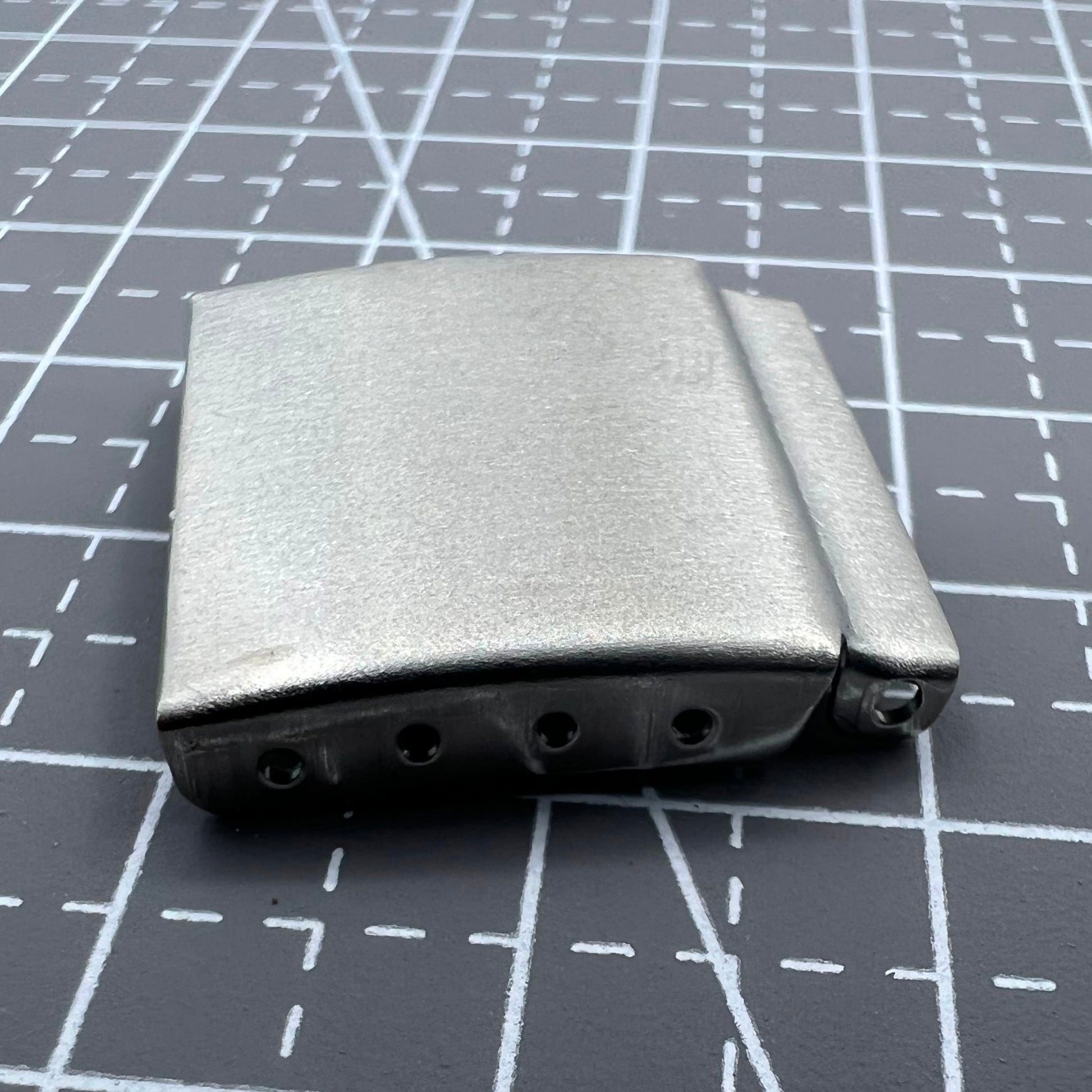 Set of 14 silver watch strap extenders with clasps, improving fit for diverse watch bracelets.