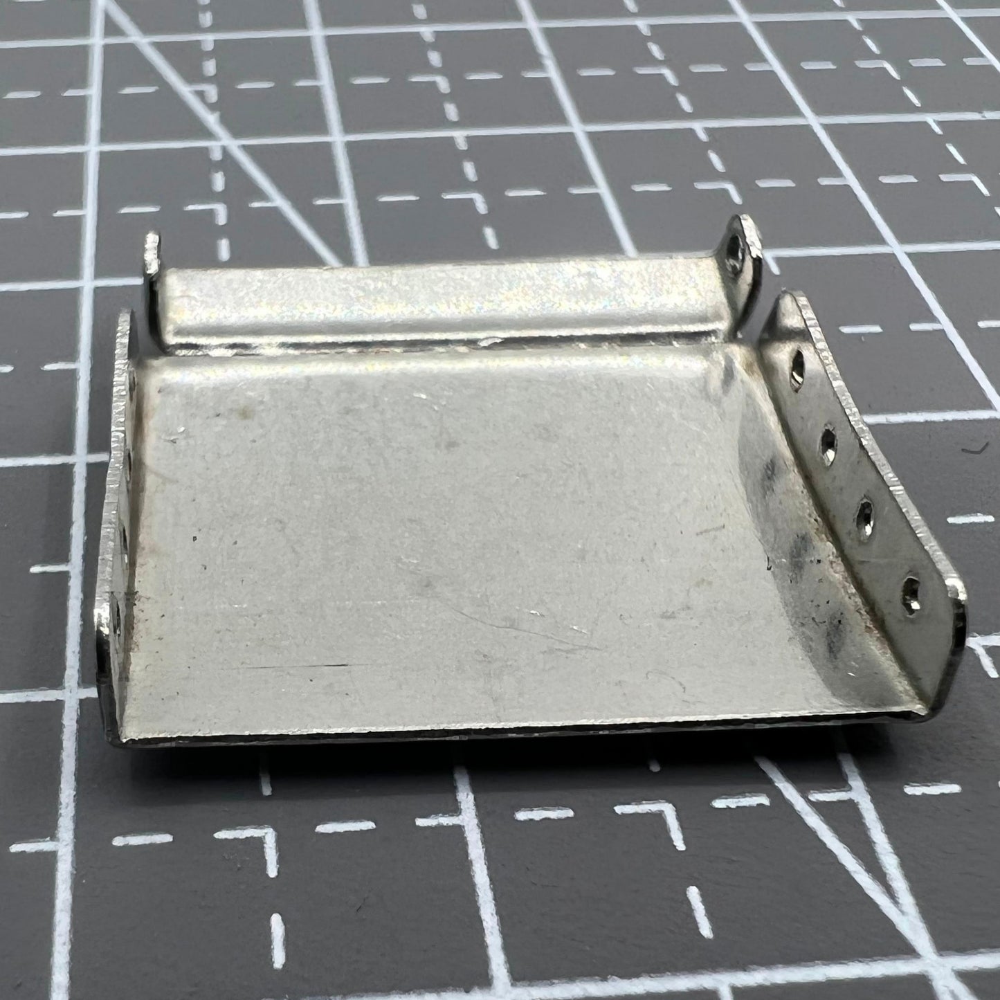 Set of 14 silver watch strap extenders with clasps, improving fit for diverse watch bracelets.