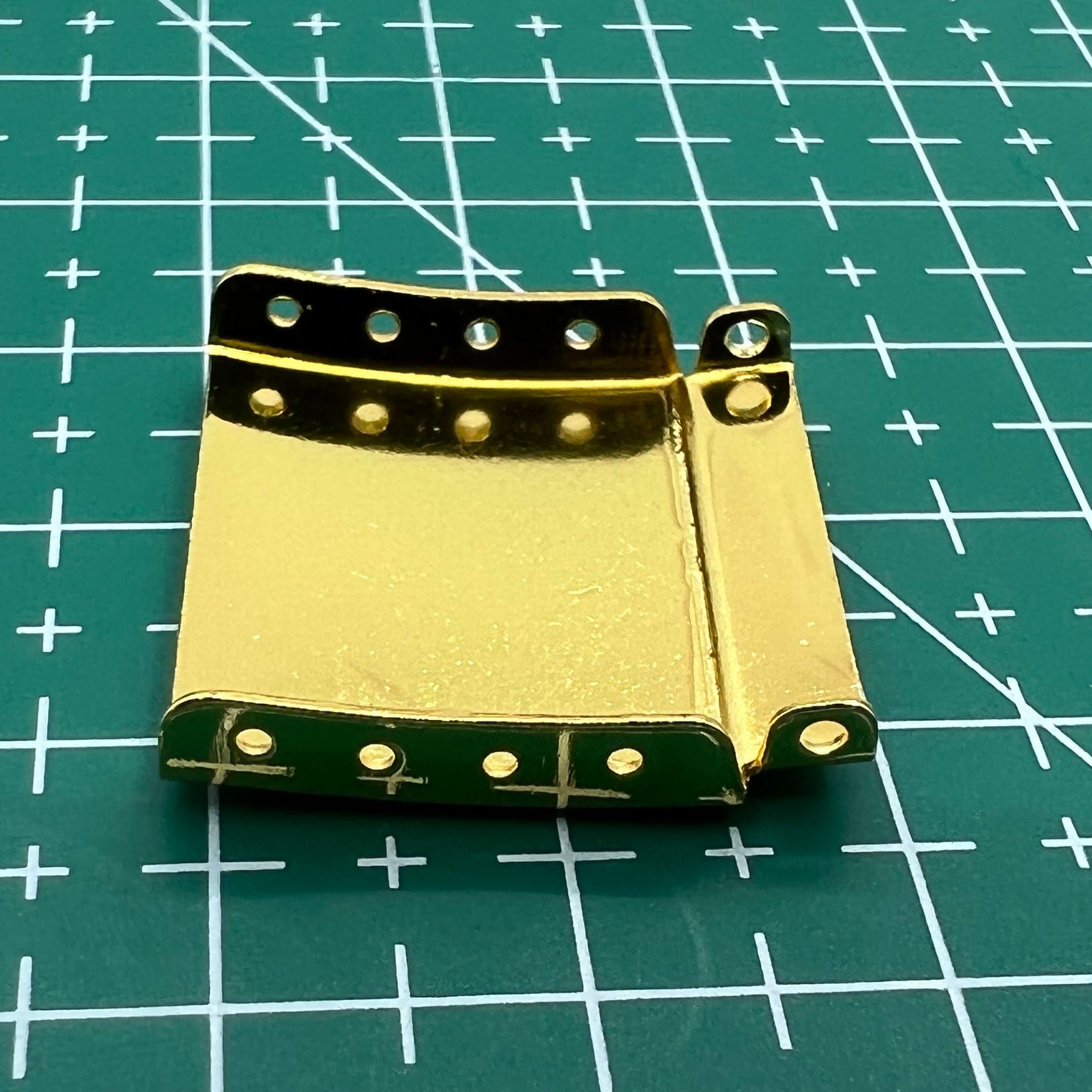 Set of 14 golden watch strap extenders with clasps for adjustable bracelet length, compatible with multiple watch brands.