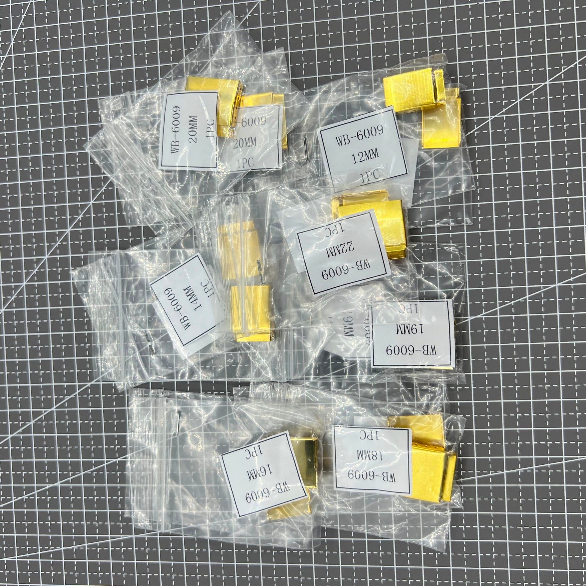 Set of 14 golden watch strap extenders with clasps, perfect for bracelet adjustments and fit customization