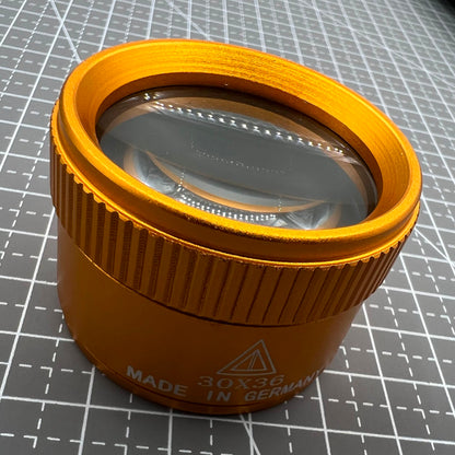 Germany Made Gold 30X magnifier loupe, ideal for precise watch repair and jewelry inspection.