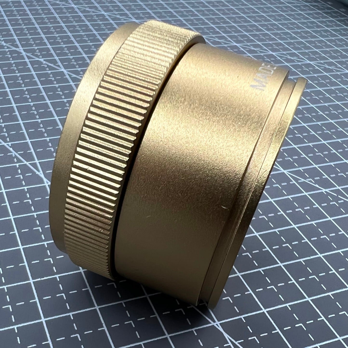 Bright golden 30X magnifier loupe, perfect for detailed watch repair and jewelry inspection.