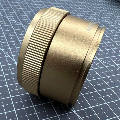 Bright golden 30X magnifier loupe, perfect for detailed watch repair and jewelry inspection.