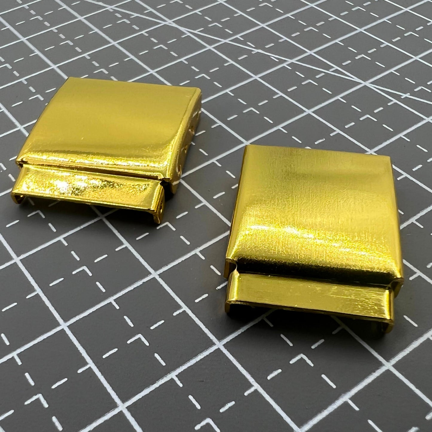 Set of 14 golden watch strap extenders with clasps for precise bracelet link adjustments