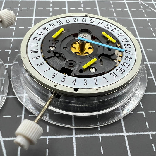 Swiss ISA 8162 quartz watch movement with date at 6, replacement for precise timekeeping.