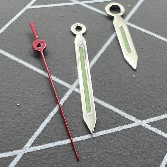 Silver-trimmed watch hand with green lume and red second hand for Miyota 2035, 2115, 2105, 2305 movements.