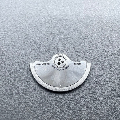 Silver rotor oscillating weight for Miyota 9015 mechanical watch movement, enhancing winding efficiency.