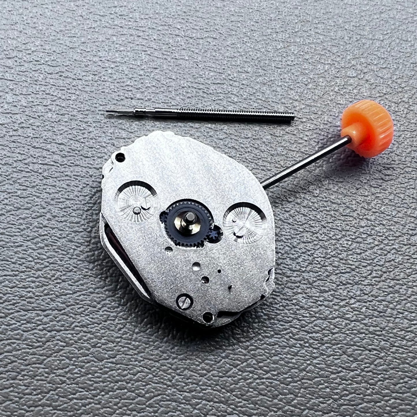 Japan Miyota 1L45 quartz movement with small second hand, precise watch accessory for repair and customization.