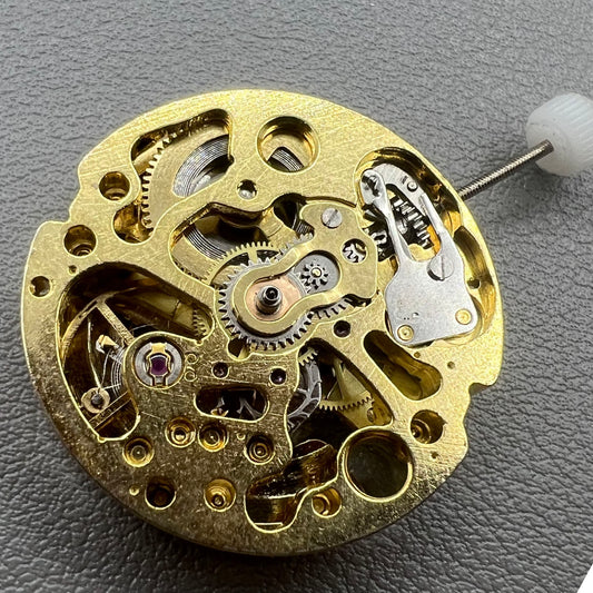 Golden 26.5mm hollow carved watch accessory with automatic 7120 mechanical movement, precision-engineered.