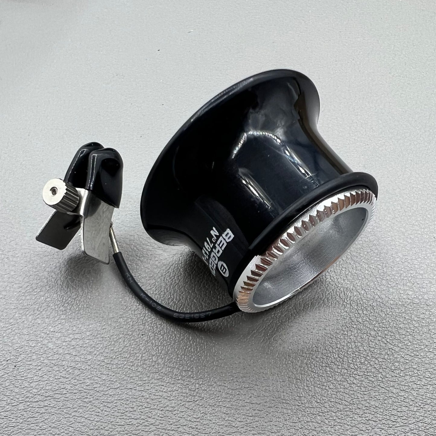 Swiss Bergeon 7913 3.3x magnifying eyeglass clip for precise watch accessory repairs and adjustments.