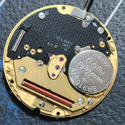 Swiss Made watch accessory with ETA255.412 quartz movement, black dial, and gold accents for elegant timekeeping.