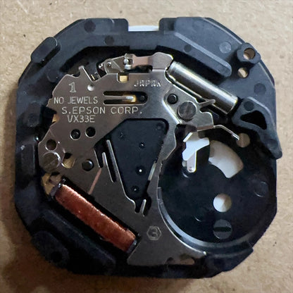 Epson VX33 quartz watch movement with 3 hands and French-English date at 6 o'clock, 3-piece set.