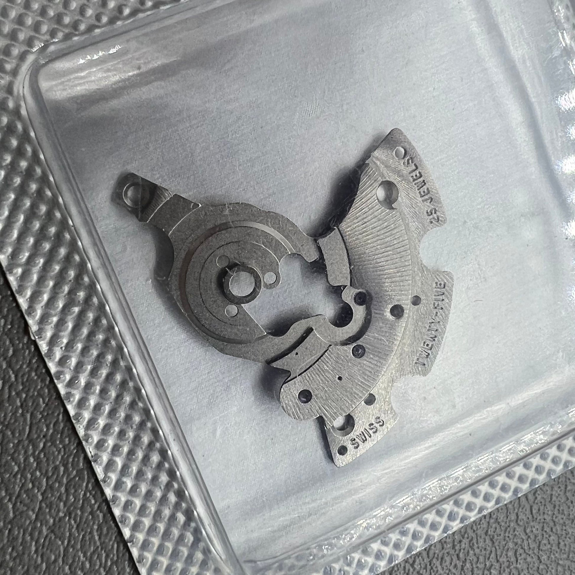 Original SW300-1134 automatic watch movement bridge and wheel by Swiss Echte for SW300 caliber.