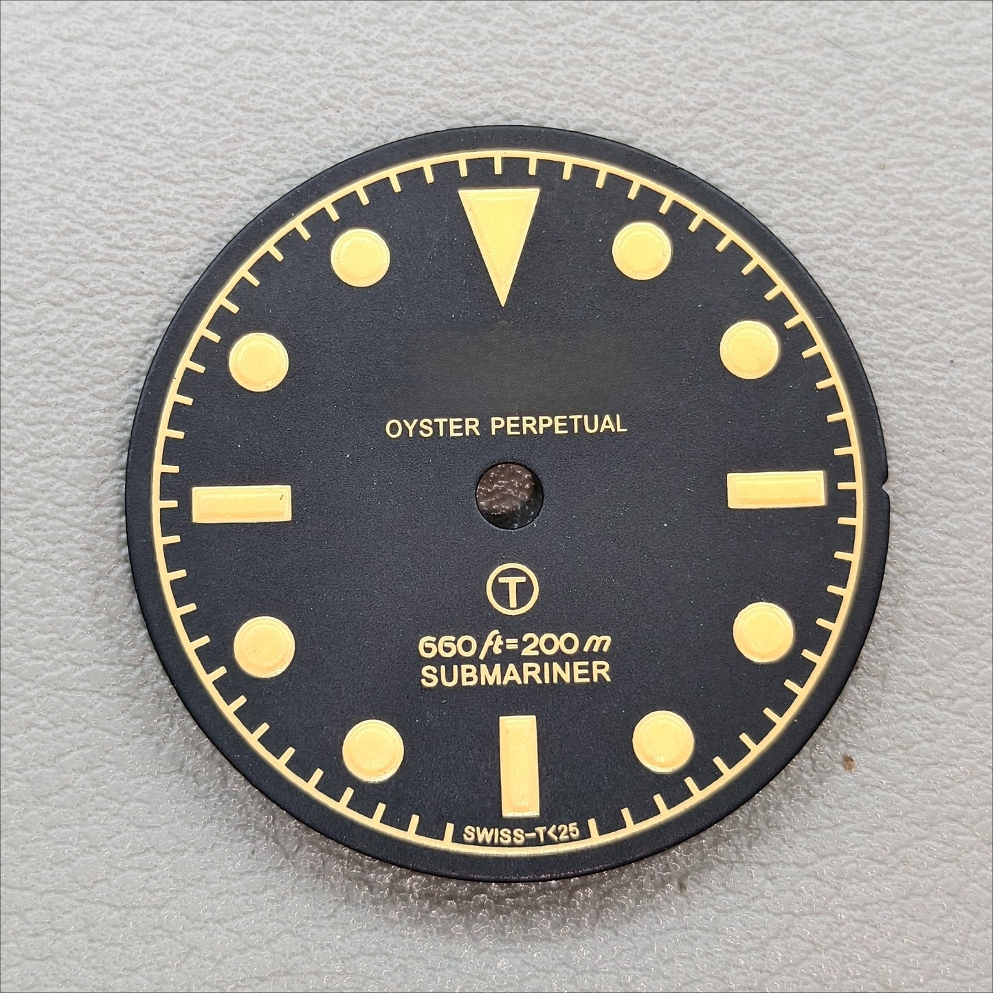 watch dial with R logo