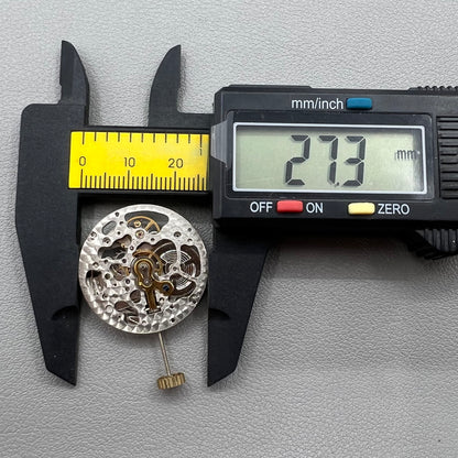 Hangzhou 2189 Silver watch with hollow mechanical movement and single calendar display accessory.