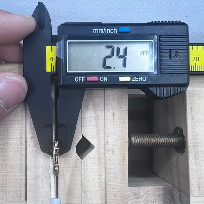 Swiss Ronda 775 quartz watch part with white date disk at 6 o'clock, ideal for precise repairs.
