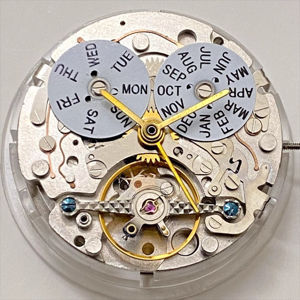 Shanghai brand watch accessory with multifunctional mechanical movement and 4 hands displaying weekly calendar at 12 o'clock.