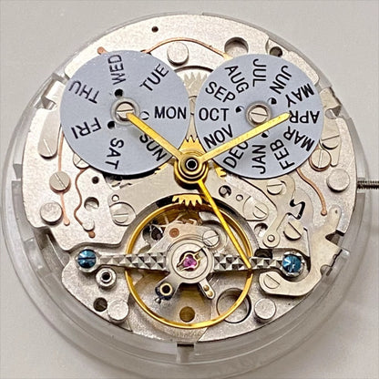 Shanghai brand watch accessory with multifunctional mechanical movement and 4 hands displaying weekly calendar at 12 o'clock.