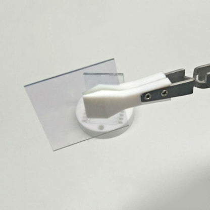 Wide headed PTFE tweezers, acid and alkali resistant, reverse self-locking for secure handling.