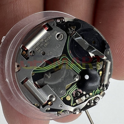 Close-up of Swiss ISA 8162 quartz watch movement with date display at 6 o'clock, perfect for watch repair accessories.