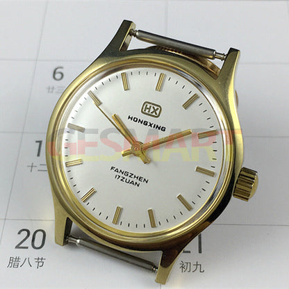 33mm Chinese manual mechanical watch with golden nails, silver dial, round golden case.