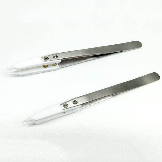 PTFE pointed tip tweezers, heatproof and chemical resistant, ideal for semiconductor lab use.