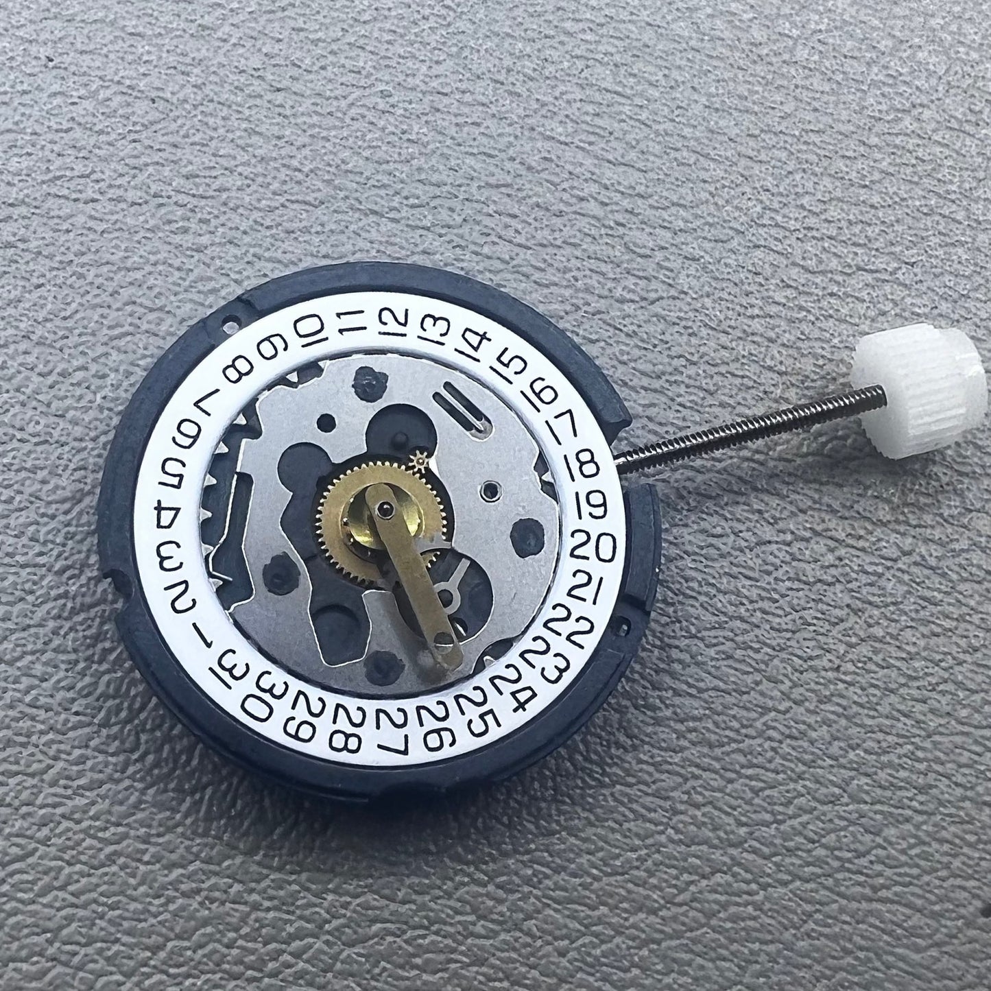 Swiss ETA 803.112 quartz watch movement with 3 hands and date window at 3 o'clock by ETA.