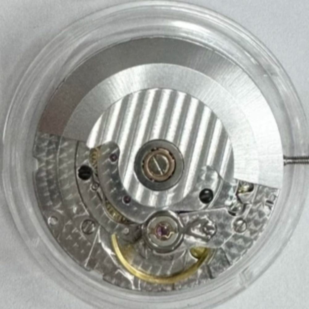 Silver carved Dandong 2824 mechanical watch movement, China-made, replaces ETA 2824-2, precision timekeeping.