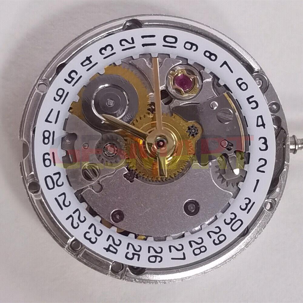Silver ETA2671 mechanical watch movement with date at 3, high-quality China-made replacement for watch repairs.