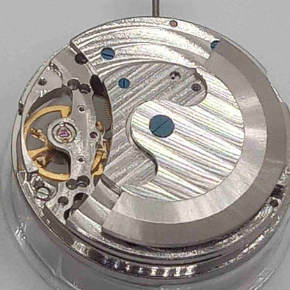Silver mechanical watch accessory with hollow movement and large 12 o'clock flywheel by China Made.