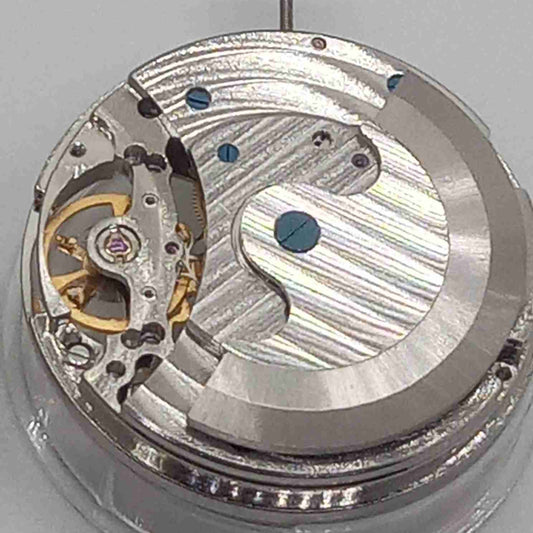 Silver mechanical watch accessory with hollow movement and large 12 o'clock flywheel by China Made.