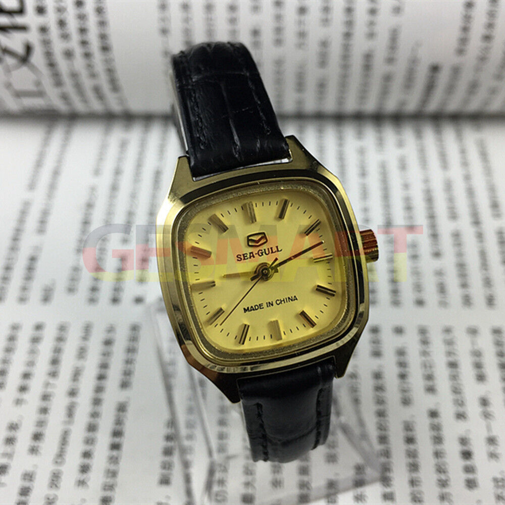 27mm golden square ladies watch by Tianjin Seagull with mechanical movement and sleek design.
