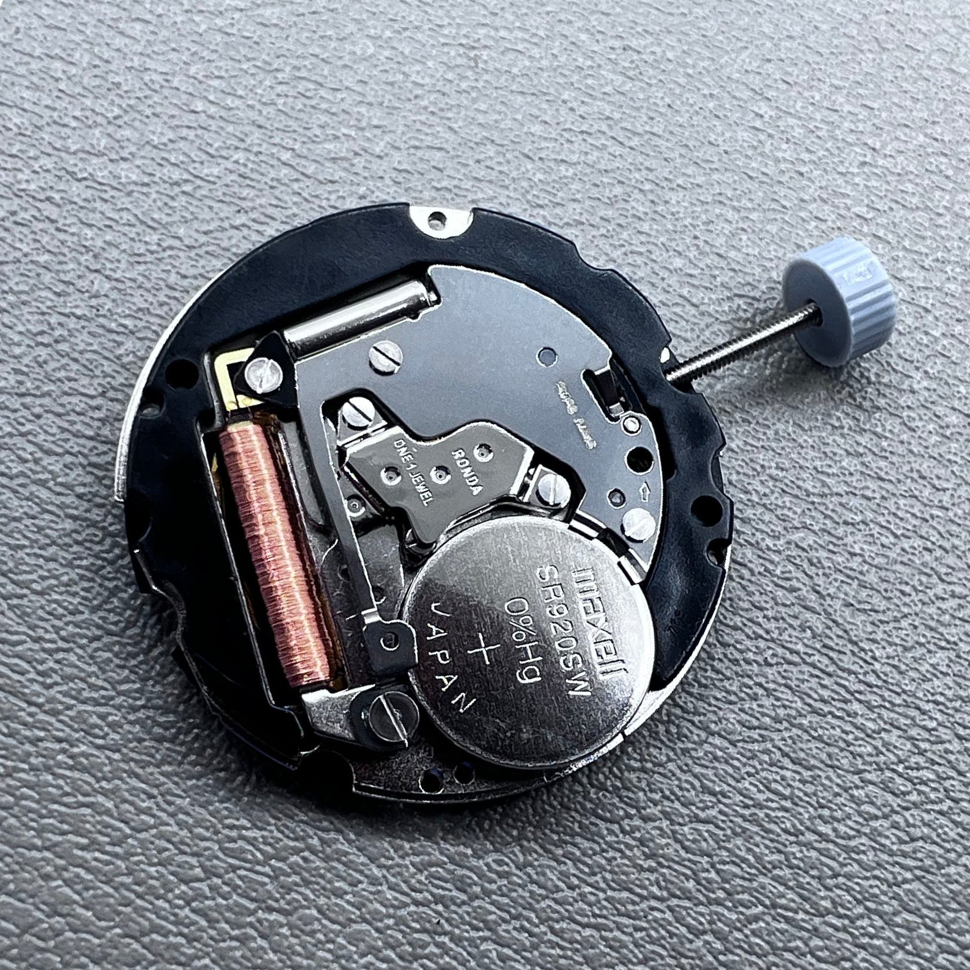Swiss Ronda 708 quartz watch movement with date display at 3 o?clock, precise and reliable mechanism.