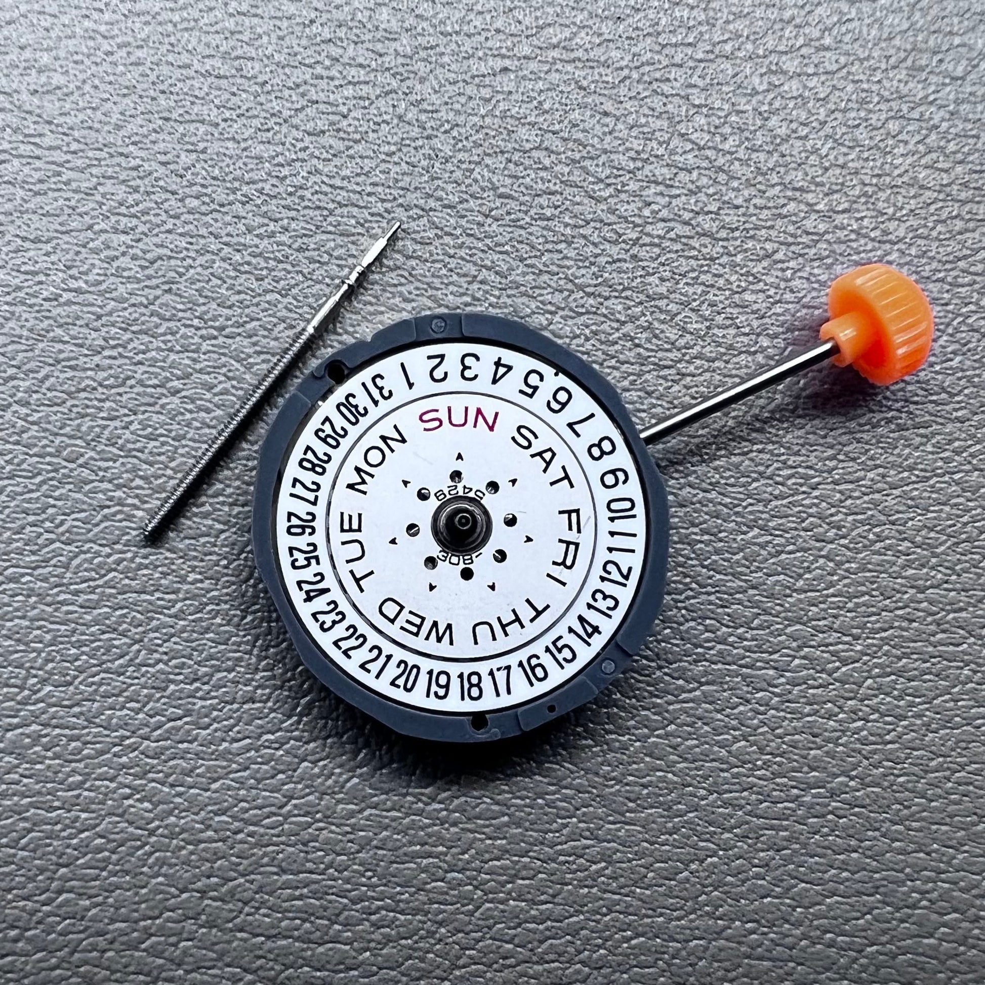 Japan Miyota 6L02 quartz watch movement with double calendar, three hands, date @6, precision timing component.