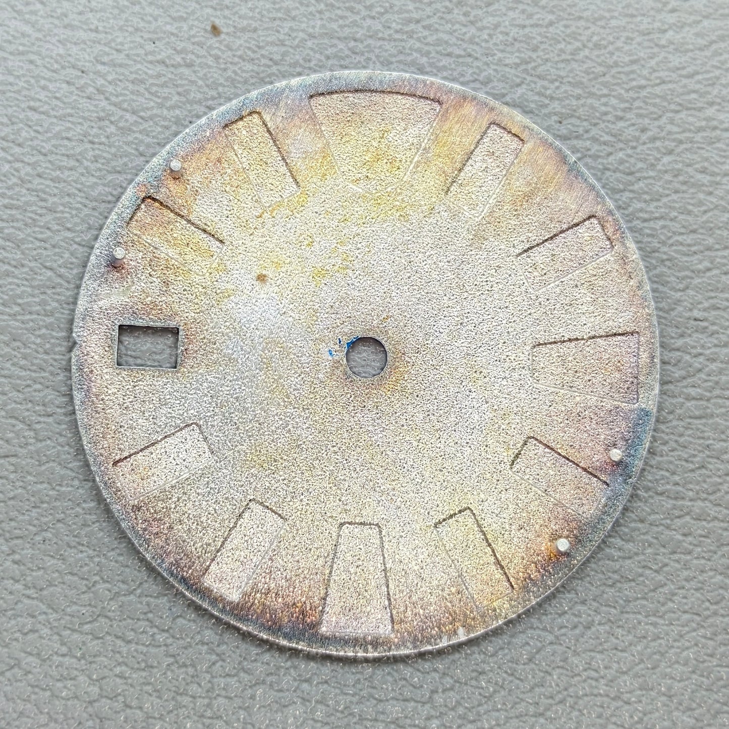 watch dial with S logo