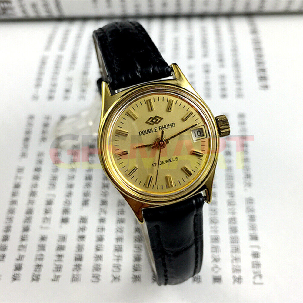 Double Rhomb lady watch featuring a golden dial, manual mechanical movement, and single calendar display by Double Rhomb.