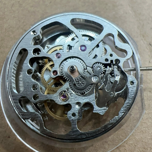 China Made No Calendar Silver 7120 mechanical watch part with 3 hands for precise timekeeping.