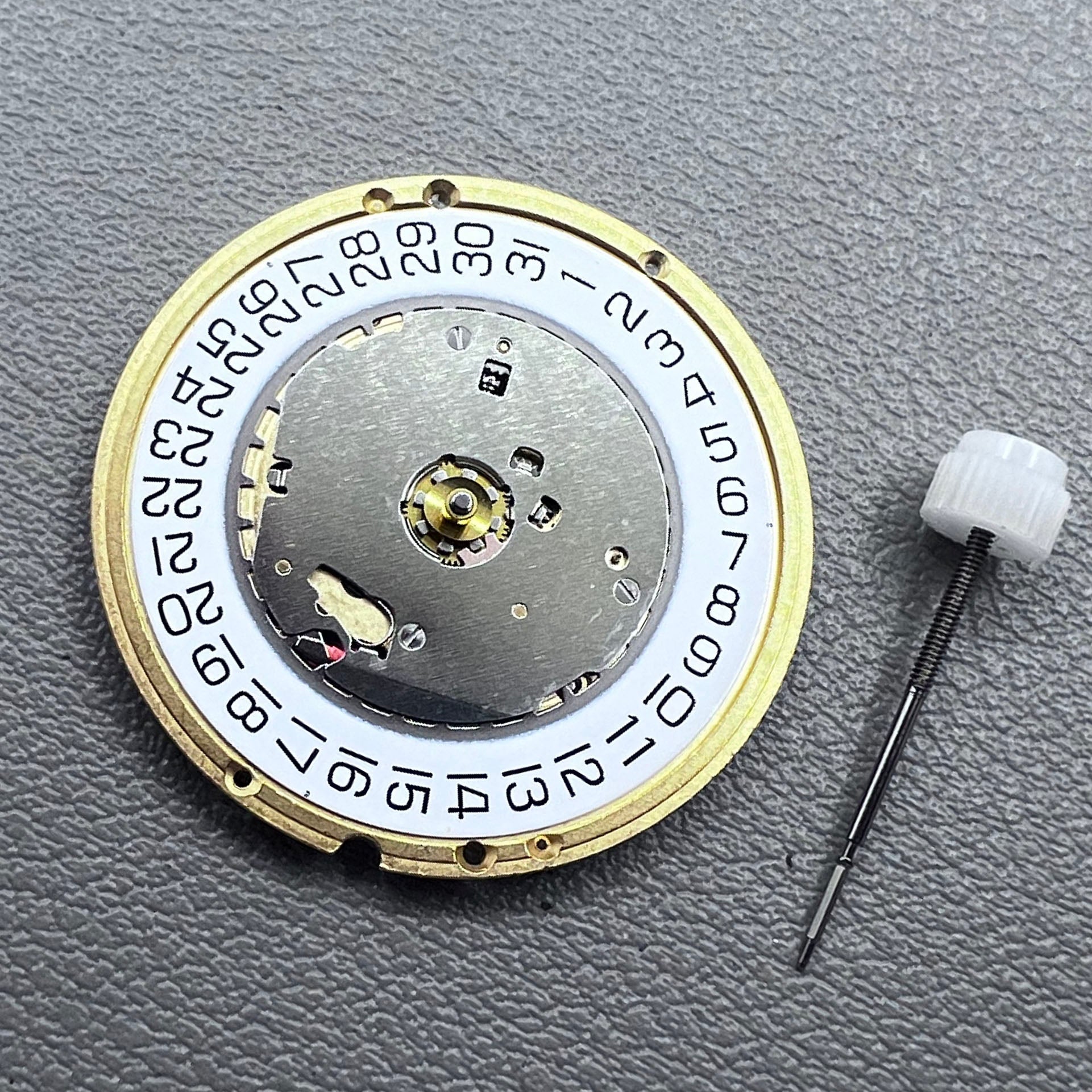 Swiss ETA E64.511 quartz watch movement with precise timekeeping for luxury watch repair and assembly.