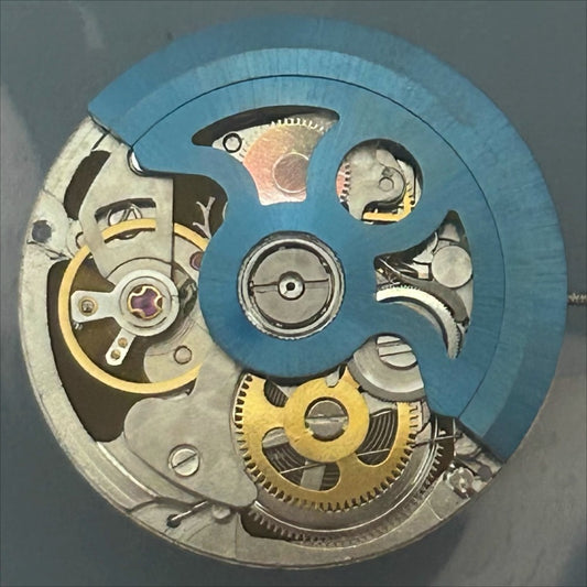Blue rotor of China Made New 2189 automatic mechanical watch movement with 3 hands, precise timekeeping.