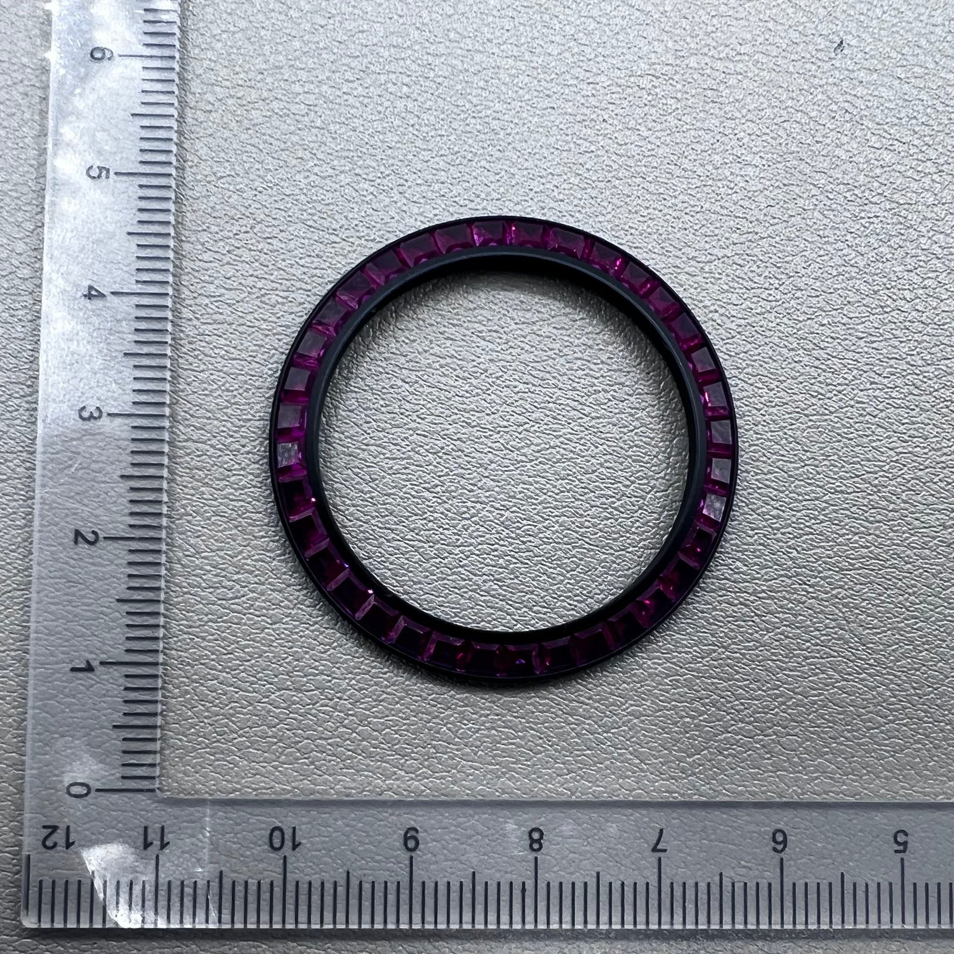 Purple T-shaped square Moissanite bezel for Daytona watch, inclined design enhancing luxury style.