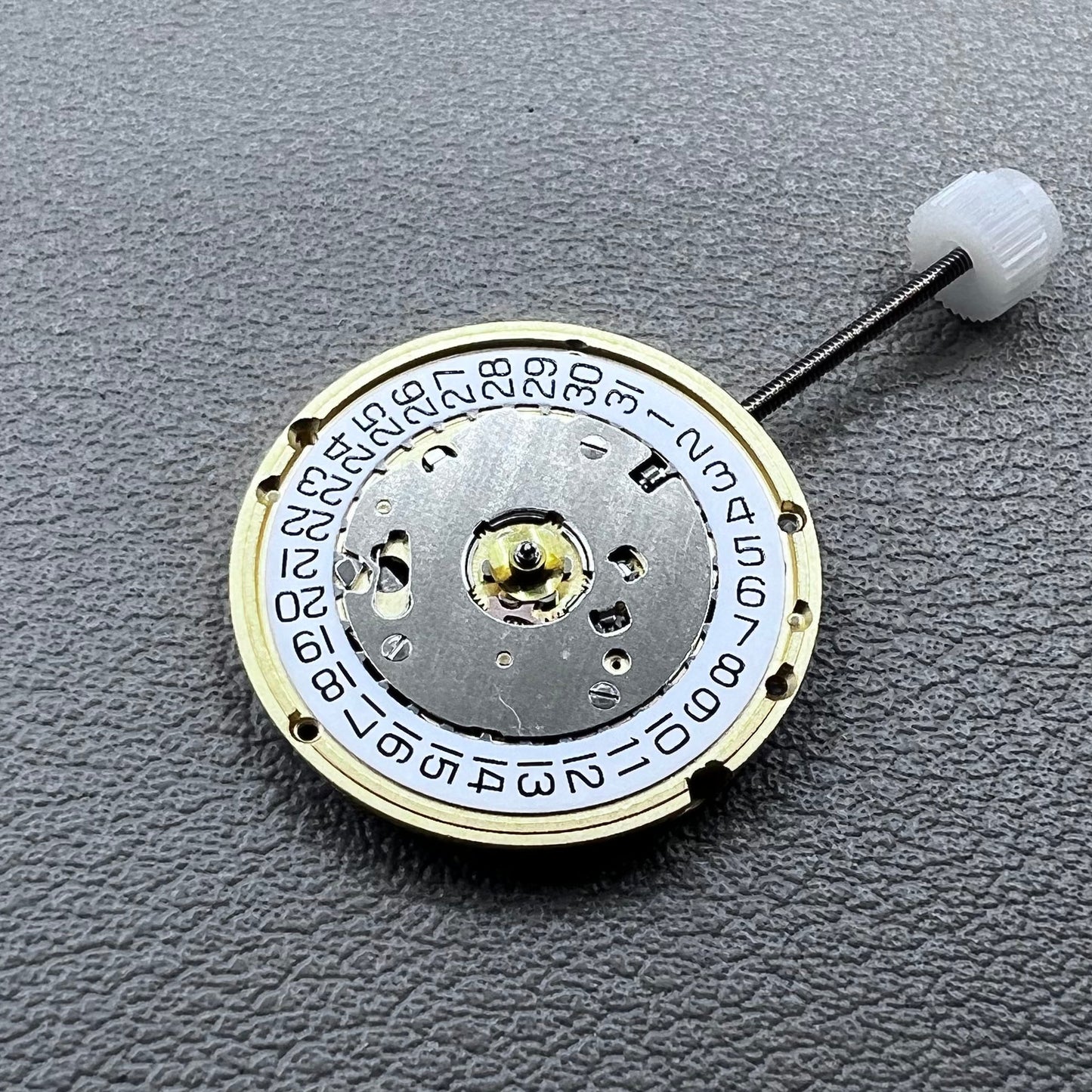 Swiss ETA E61.111 quartz watch movement with date at 3, replacement for 256.111 models, precision timing.