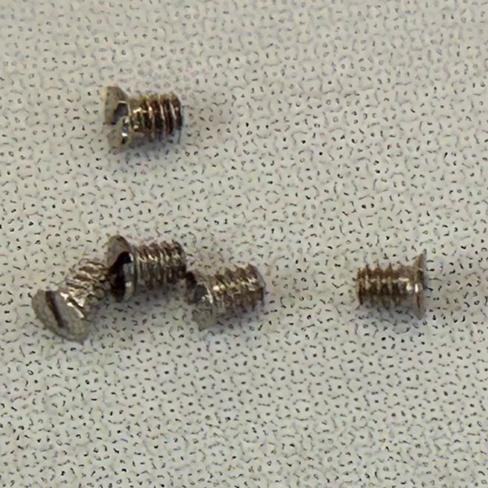 Set of 3 Swiss ETA2000 L595 Automatic Device Lower Bridge Screws for precise watch repair.
