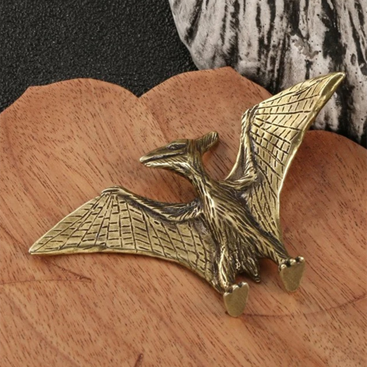 Hand-carved copper Jurassic Pterosaur dinosaur trinket, vintage bronze collectible accessory for display.