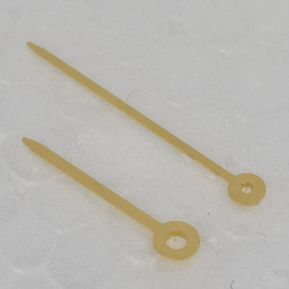 Golden watch hands for ETA movements including 282.001, E03.001, 976.001, and 2000-1.
