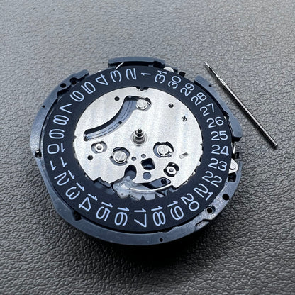 Japan Seiko VK63 quartz watch movement with black disk and white font for precise timekeeping.