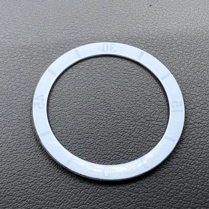 White 36mm ceramic watch bezel insert with numeral markings for men's and women's watches.