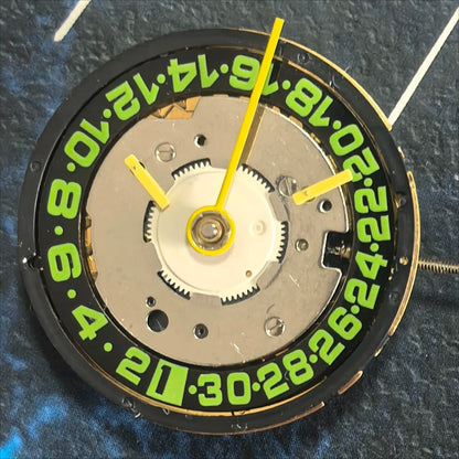 Swiss ISA 8175 Watch Quartz Movement 5 Hands Golden Plated Green Font Date At 6