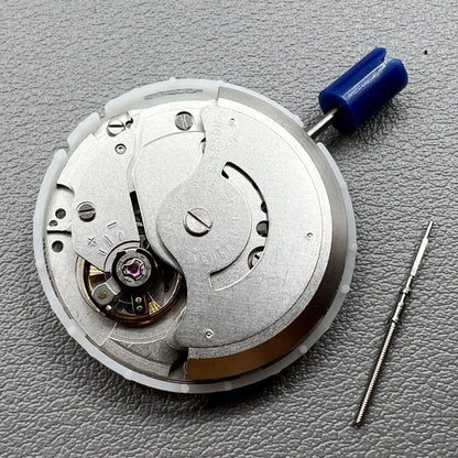 Japan Epson YN56 mechanical watch movement showing date and day functions.