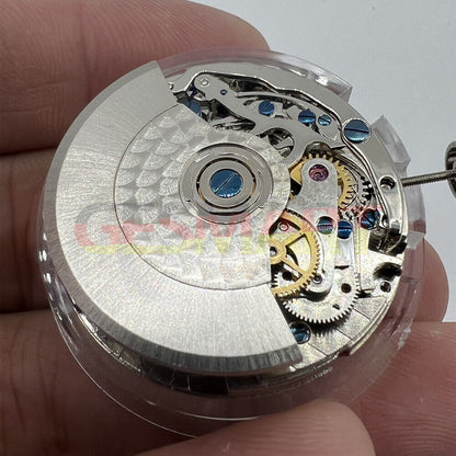 Close-up of Tianjin Seagull ST1940 automatic watch movement with small second hand, showcasing Chinese precision craftsmanship.